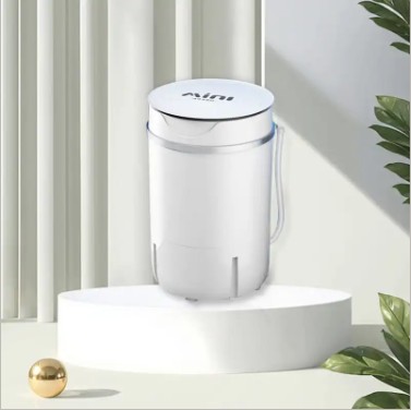 White mini washing machine compact portable washer with transparent lid and carry handle shown on white display platform